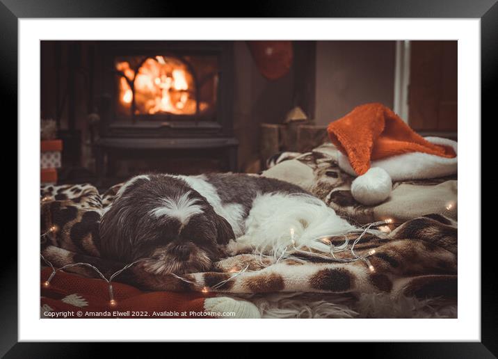 Dog Sleeping By Roaring Log Fire Framed Mounted Print by Amanda Elwell