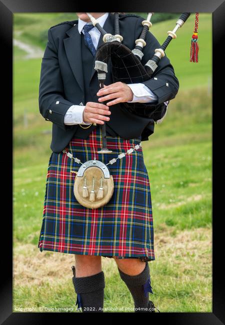 Scottish bagpiper in traditional kilt in the Highl Framed Print by Delphimages Art