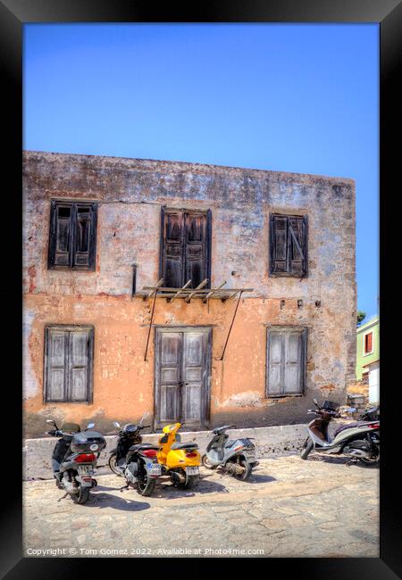 Transport in front of a ruin Framed Print by Tom Gomez