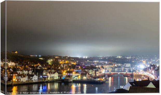 Whitby Harbour Illuminated At Night Canvas Print by Peter Greenway