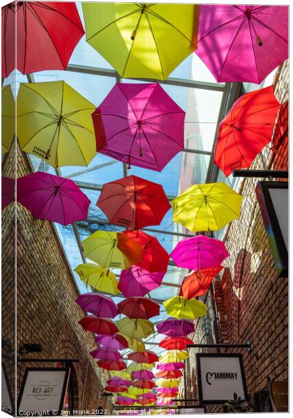 Camden Market Umbrellas Canvas Print by Jim Monk