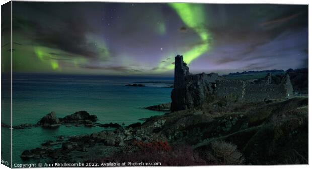 Northern lights over Dunure Castle Canvas Print by Ann Biddlecombe