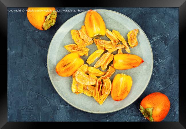 Dried persimmon fruits. Framed Print by Mykola Lunov Mykola