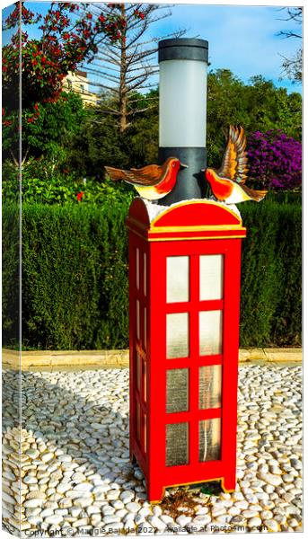 Christmas Decorations- Red Telephone Box with Bird Canvas Print by Maggie Bajada
