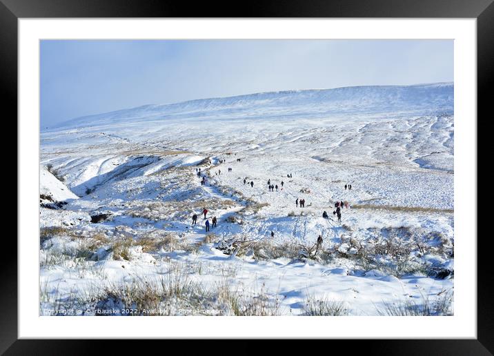 Walking up Pen Y Fan in the snow, Brecon Beacons Framed Mounted Print by  Garbauske