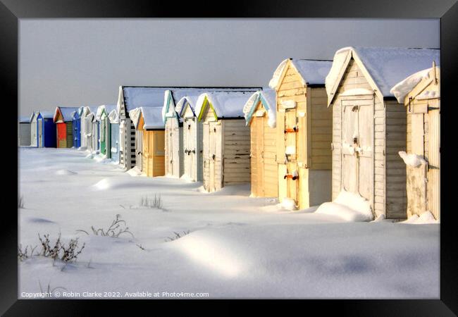 Beach Huts in Snow Framed Print by Robin Clarke