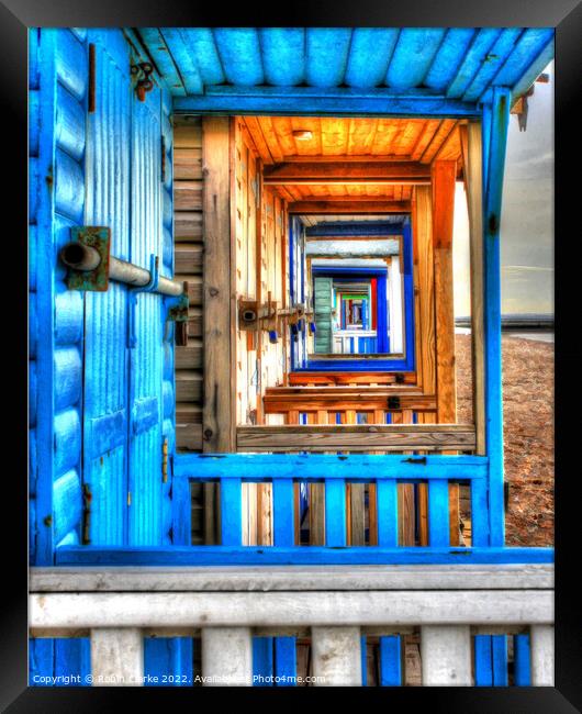 Looking through the beach huts Framed Print by Robin Clarke