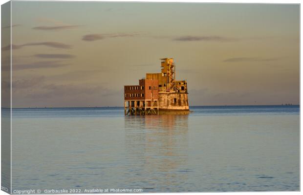 Abandoned Grain Tower at high tide in the evening  Canvas Print by  Garbauske