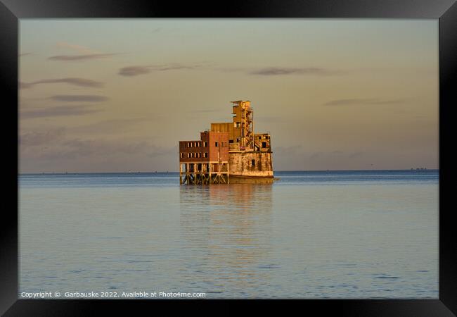 Abandoned Grain Tower at high tide in the evening  Framed Print by  Garbauske