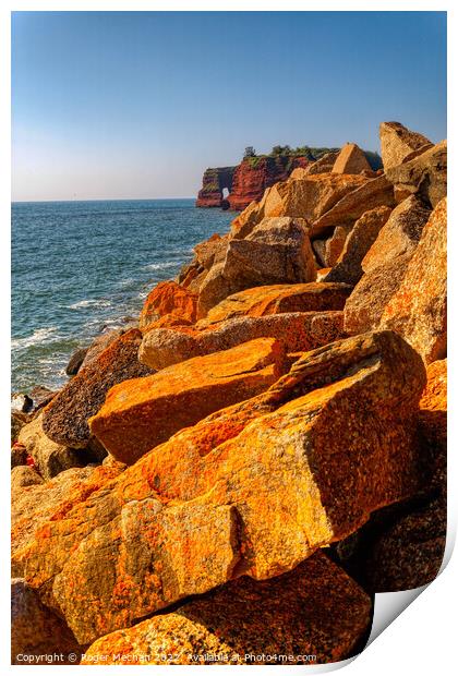Radiant Sunset over Lichen-Covered Rocks Print by Roger Mechan