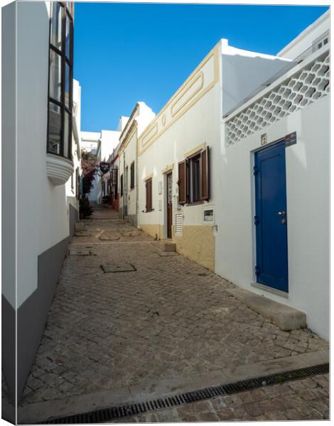 The cobbled streets of Albufeira Canvas Print by Tony Twyman