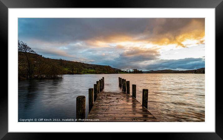 Coniston jetty at sunset Framed Mounted Print by Cliff Kinch