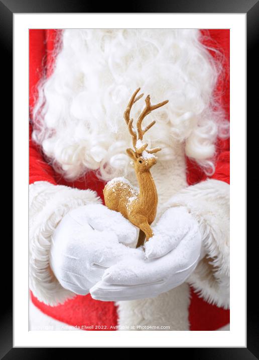 Santa Holding Reindeer Figure Framed Mounted Print by Amanda Elwell