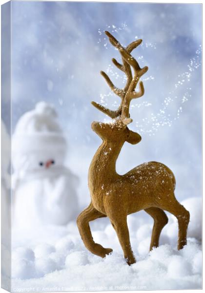 Reindeer In Snow Canvas Print by Amanda Elwell