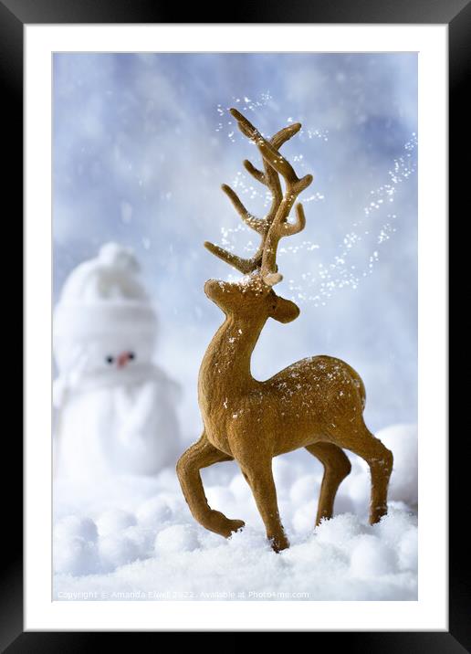 Reindeer In Snow Framed Mounted Print by Amanda Elwell