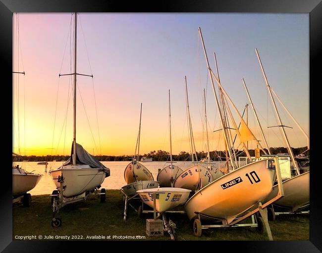Yacht at Sunset Framed Print by Julie Gresty