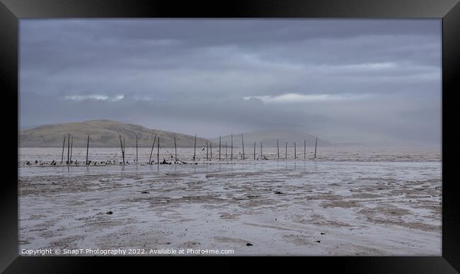 The salmon nets at Balcary Bay at Auchencairn on a cloudy wet day in Scotland Framed Print by SnapT Photography