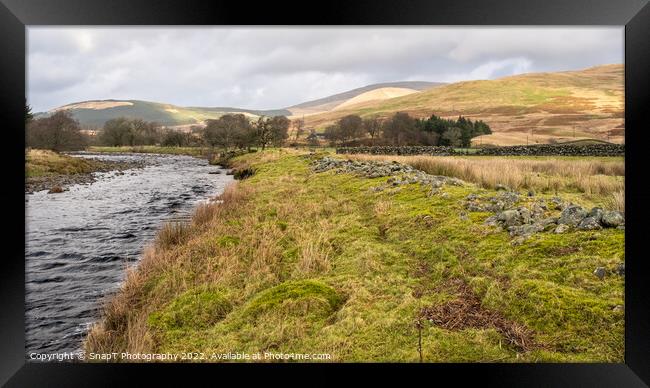 Close up of dredged river rocks offering flood bank protection for fields Framed Print by SnapT Photography