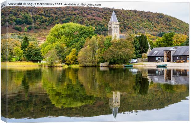 Church tower and Lake of Menteith Fisheries cabin Canvas Print by Angus McComiskey