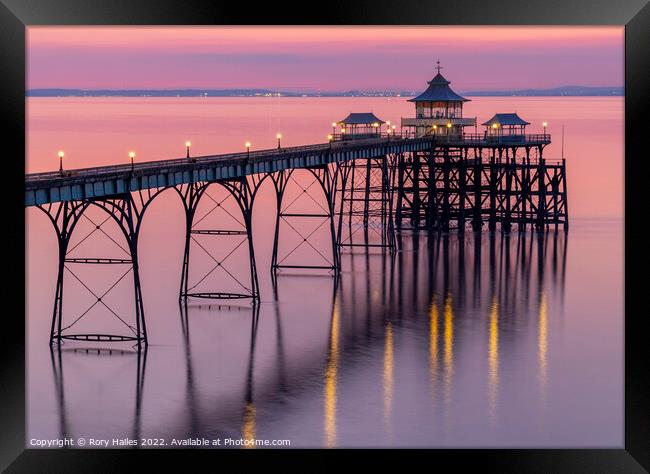Clevedon Pier with its lights on Framed Print by Rory Hailes