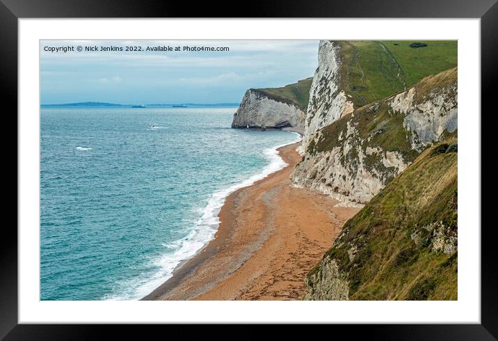The sandy beach at Durdle Door under chalk cliffs  Framed Mounted Print by Nick Jenkins