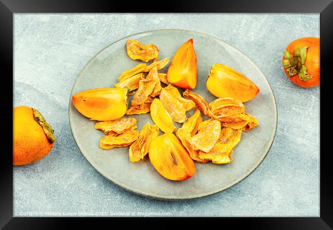 Appetizing dried persimmon. Framed Print by Mykola Lunov Mykola
