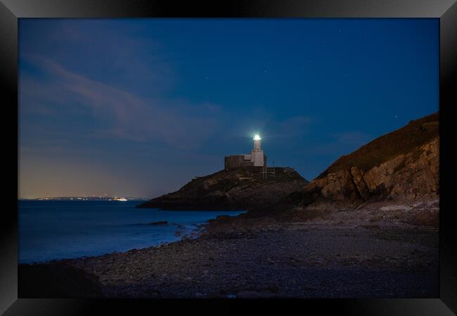 Mumbles lighthouse at night Framed Print by Bryn Morgan