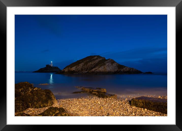 Mumbles lighthouse at night Framed Mounted Print by Bryn Morgan
