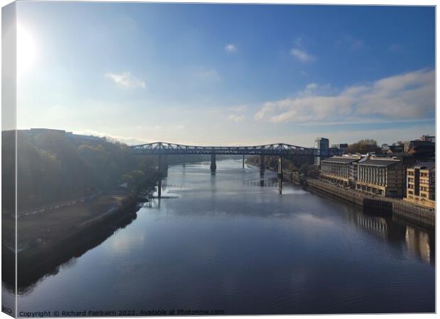 A view along the River Tyne Canvas Print by Richard Fairbairn