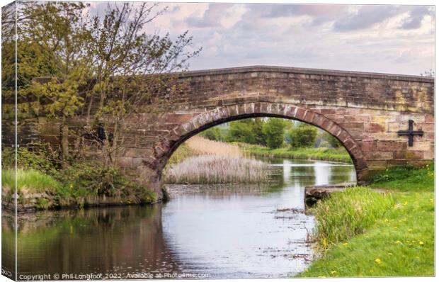 Canal bridge over Leeds Liverpool Canal near Liverpool Canvas Print by Phil Longfoot