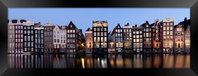 Dancing houses at night amsterdam natherlands Framed Print by Sonny Ryse