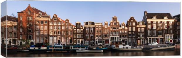 Singel Canal houses at sunset Amsterdam Netherlands Canvas Print by Sonny Ryse