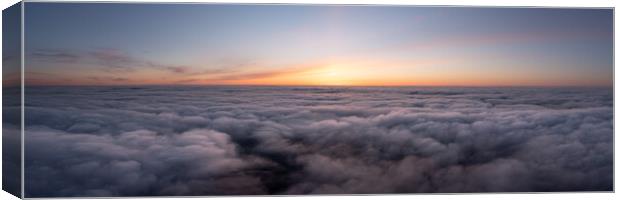 Sunset Above the Clouds Canvas Print by Sonny Ryse