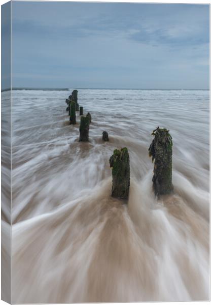 Cloudy sunrise at Sandsend Canvas Print by Kevin Winter