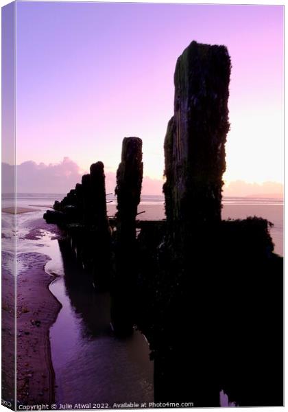 Purple sunset at Camber beach Canvas Print by Julie Atwal
