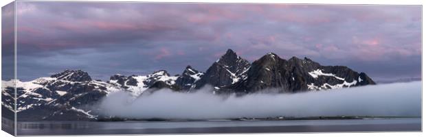 Flakstadoya Stortinden mountain and mist at sunsrise Lofoten Isl Canvas Print by Sonny Ryse