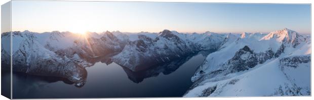 Hjørundfjord Norangsfjord fjord and mountains at sunrise in win Canvas Print by Sonny Ryse