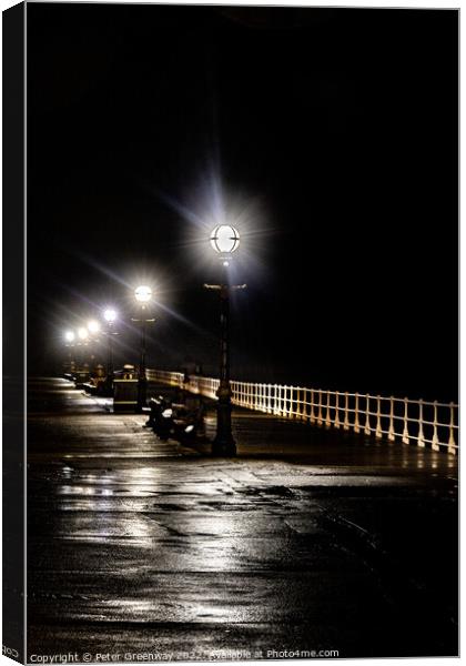 The Promenade Along Whitby Pier At Night Canvas Print by Peter Greenway