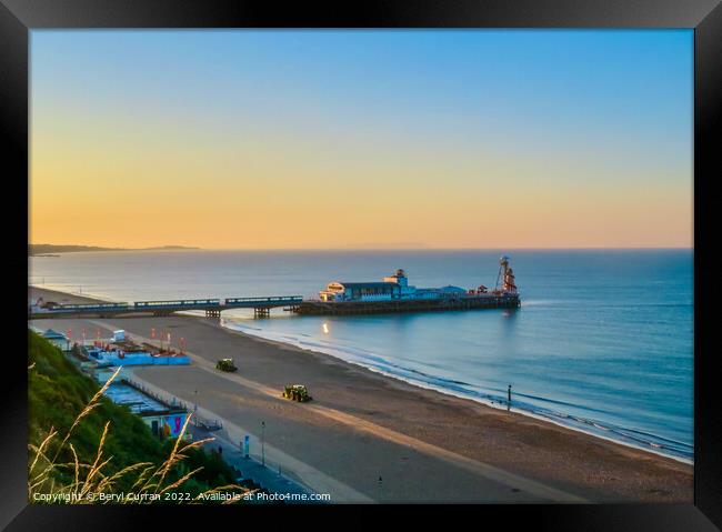 A Glowing Sunrise over Bournemouth Beach Framed Print by Beryl Curran