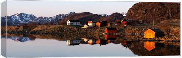 Norwegian arctic circle village cabins and boathouses lofoten Is Canvas Print by Sonny Ryse