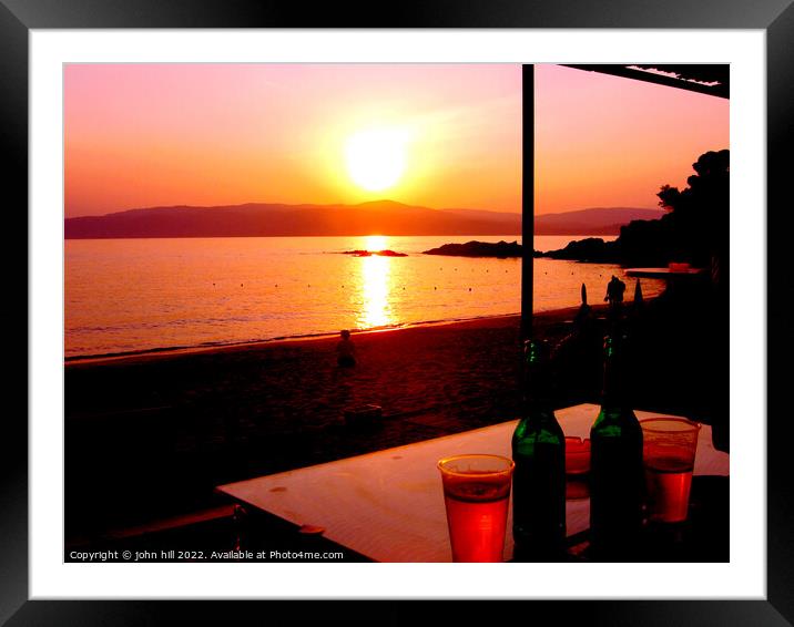 Sunset across the sea at Agia Eleni beach Skiathos, Greece. Framed Mounted Print by john hill