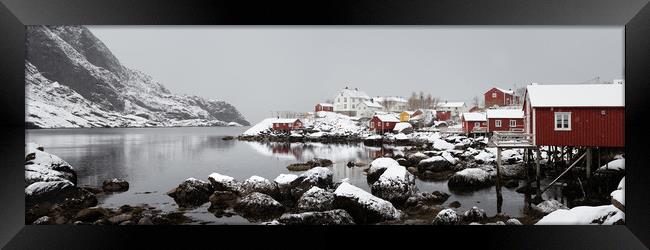 Nusfjord fishing village cabins huts covered in snow Lofoten Isl Framed Print by Sonny Ryse