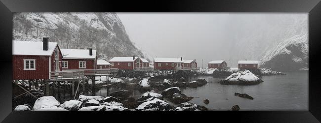 Nusfjord Red cabins huts covered in snow Lofoten Islands arctic  Framed Print by Sonny Ryse