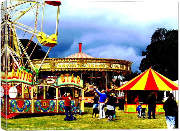 Country show funfair, Nottinghamshire, UK. Canvas Print by john hill