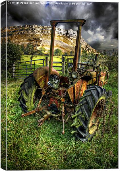 tractor below the eglwysegs Canvas Print by meirion matthias