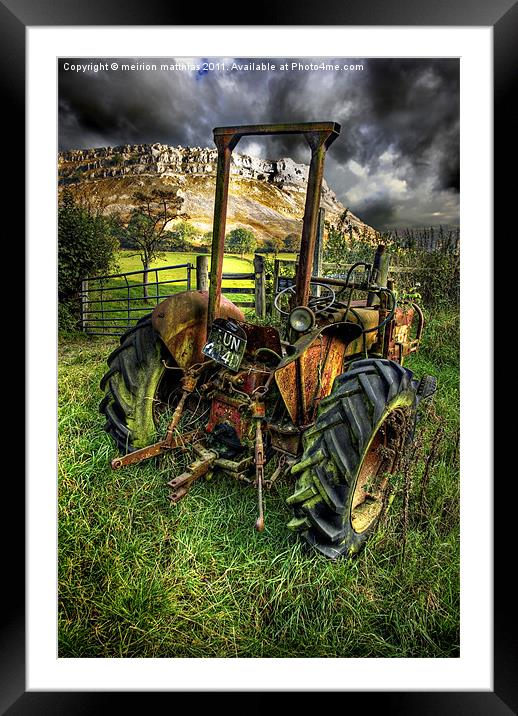 tractor below the eglwysegs Framed Mounted Print by meirion matthias