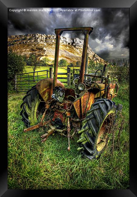tractor below the eglwysegs Framed Print by meirion matthias