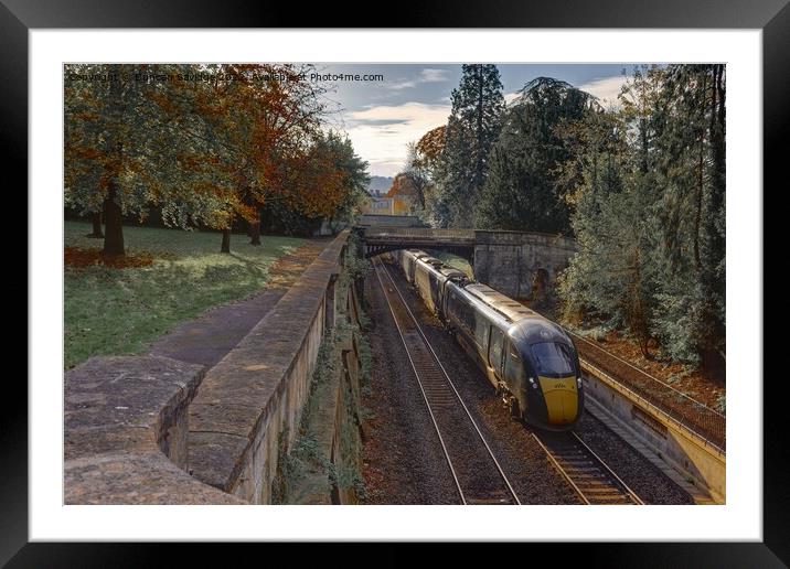 A train traveling through Sydeny Gardens Bath Framed Mounted Print by Duncan Savidge