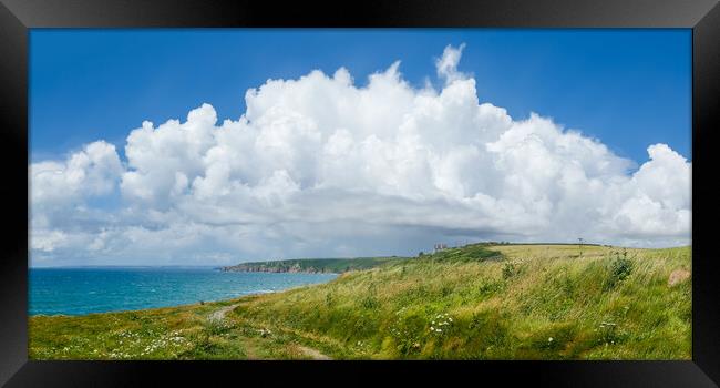 Cumulus Clouds over Beacon Crag, Porthleven Framed Print by Adrian Burgess