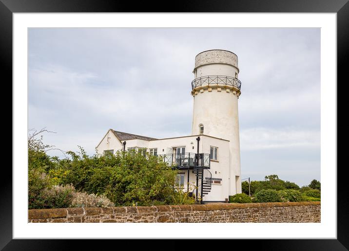 Hunstanton lighthouse over a wall Framed Mounted Print by Jason Wells